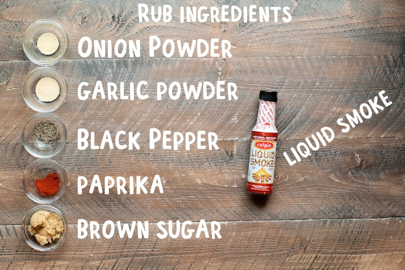 Photo with text: Onion powder, garlic powder, black pepper, paprika, brown sugar and liquid smoke.