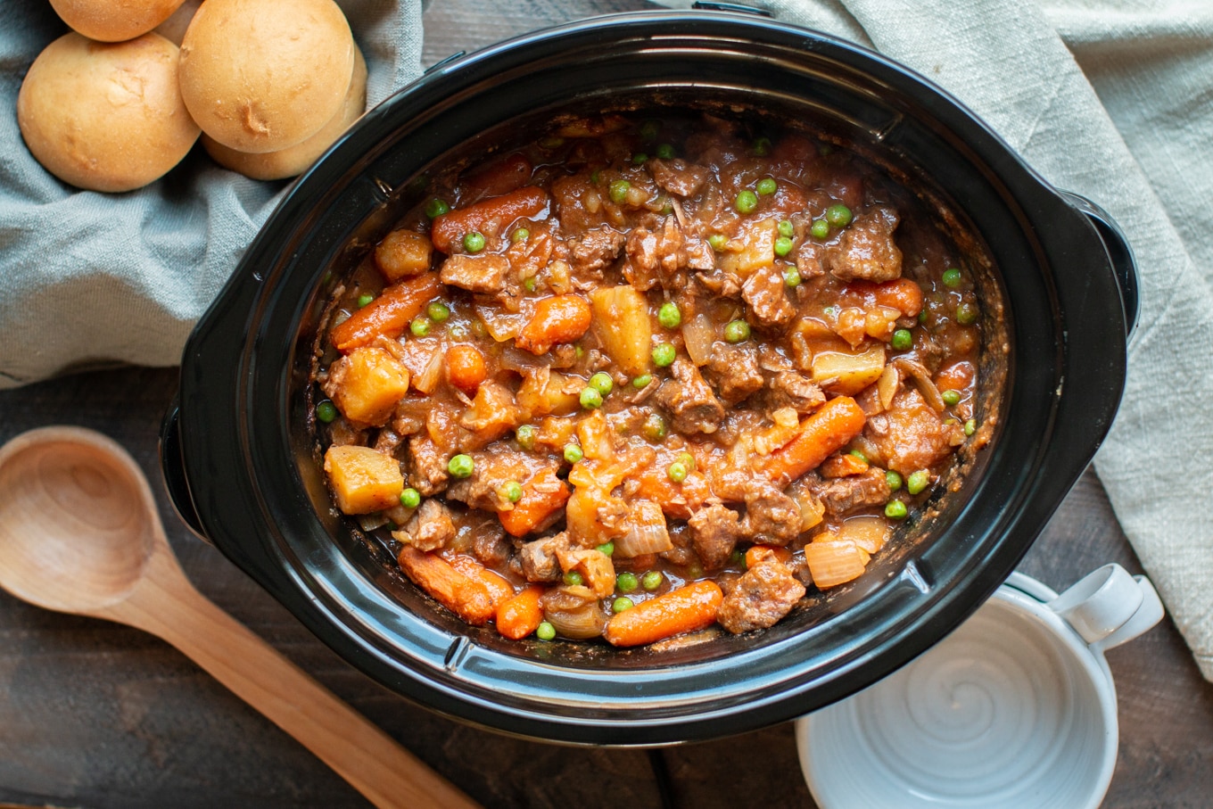 cooked thick beef stew in a slow cooker