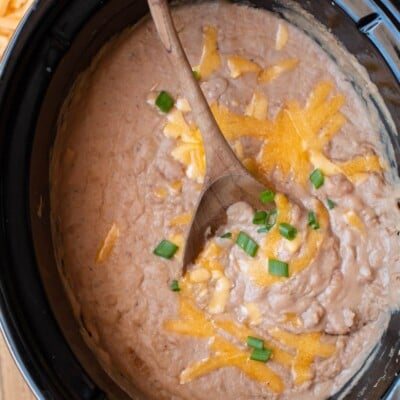 pureed refried beans in a slow cooker.