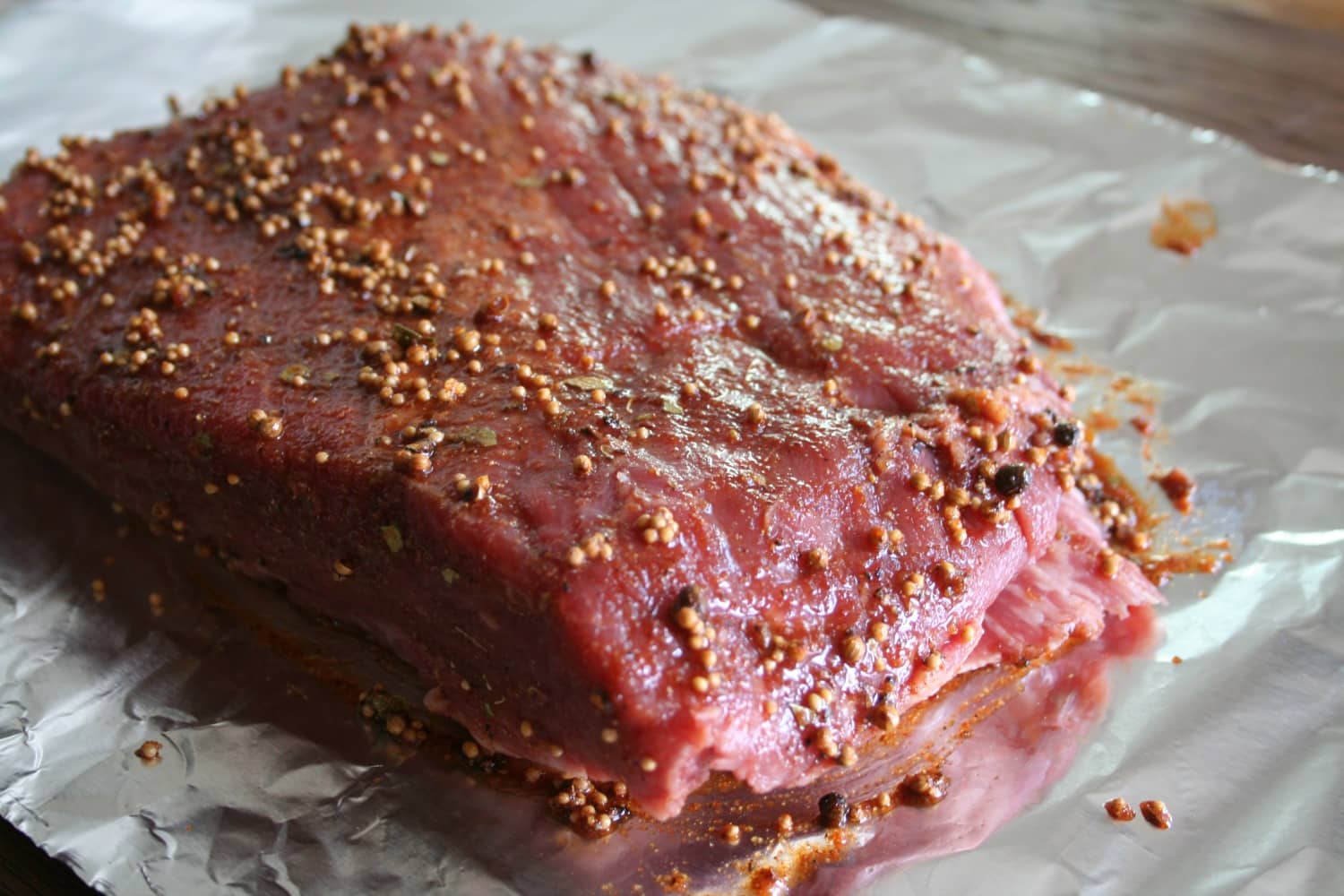 Corned beef on foil before cooking