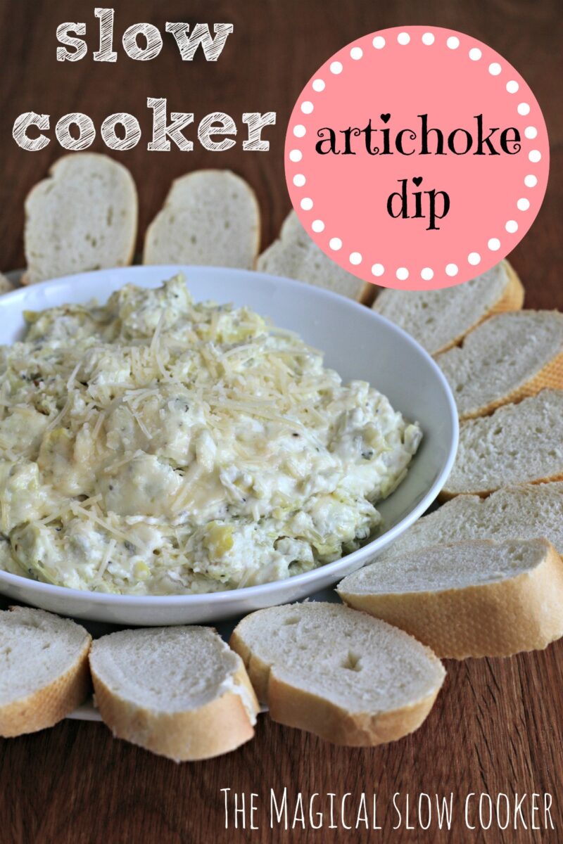 Artichoke dip garnished with parmesan cheese in white bowl surrounded by French bread.