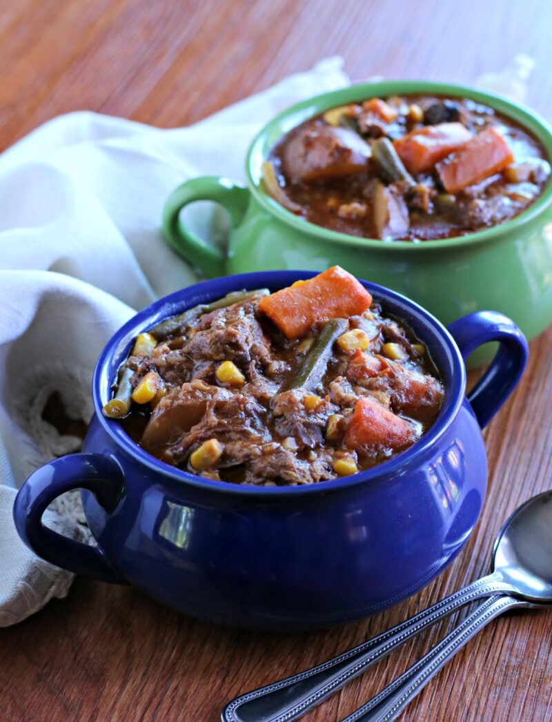 close up photo of 2 bowls of beef stew