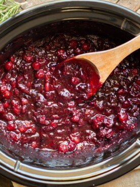 Cooked cranberry sauce in a slow cooker.