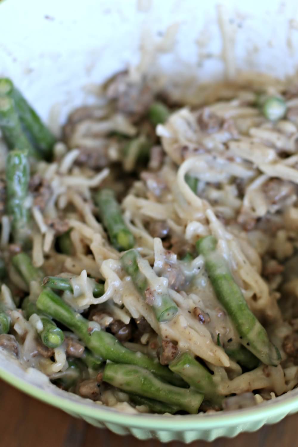 bowl of hashbrowns, green beans, and ground beef