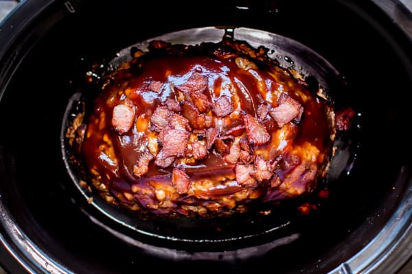 cooked bacon barbecue meatloaf in a slow cooker.