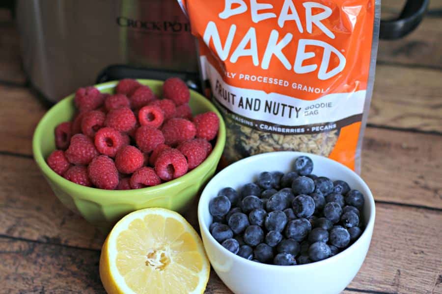 blueberries, raspberries, and a bag of granola.