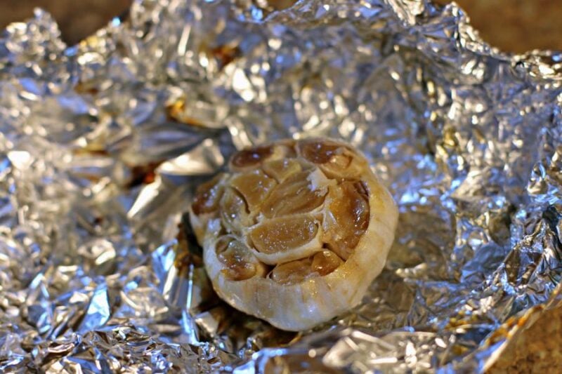 roasted garlic on foil, cooked