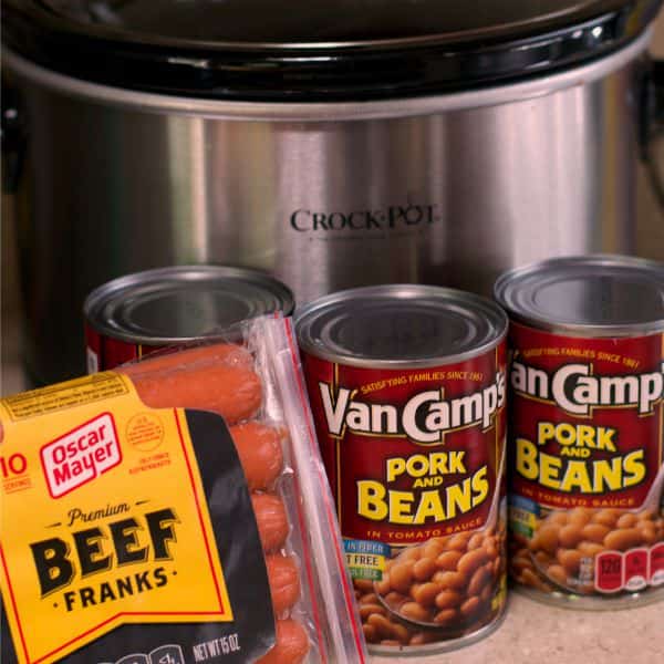 hot dogs and pork and beans in front of slow cooker