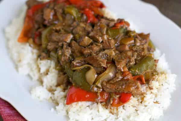 plated pepper steak on steamed rice