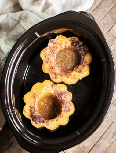 2 halves of cooked acorn squash in slow cooker