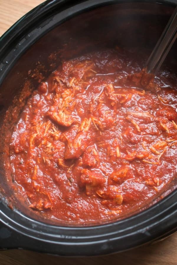 Chicken and marinara sauce cooked in slow cooker