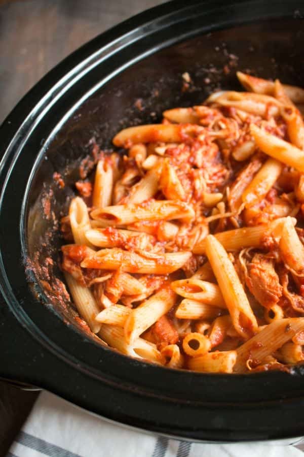 Pasta, marinara, chicken and penne pasta cooked in slow cooker.