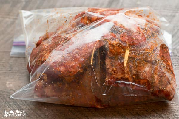 Ribs with rub on them in a ziplock bag