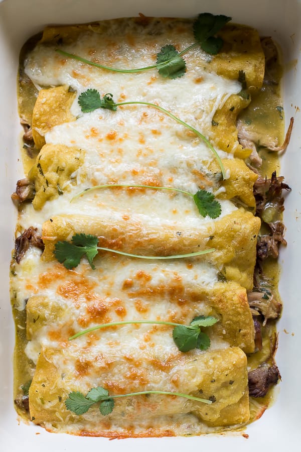 pork enchiladas in green sauce with cheese on top (9 by 13 pan)