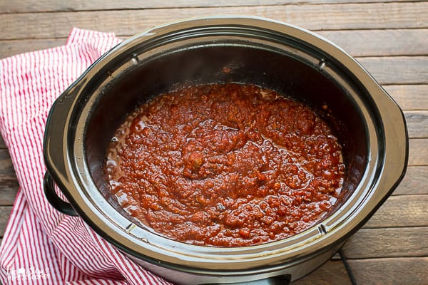 Cooked meat sauce in a slow cooker.