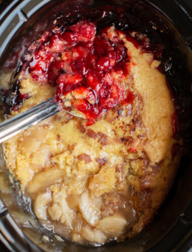 Cobbler with cherry on one half and apple on the other.