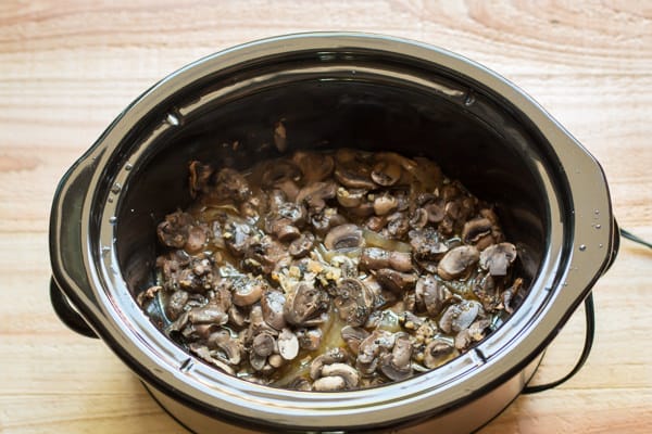 cooked mushrooms and onions in slow cooker.