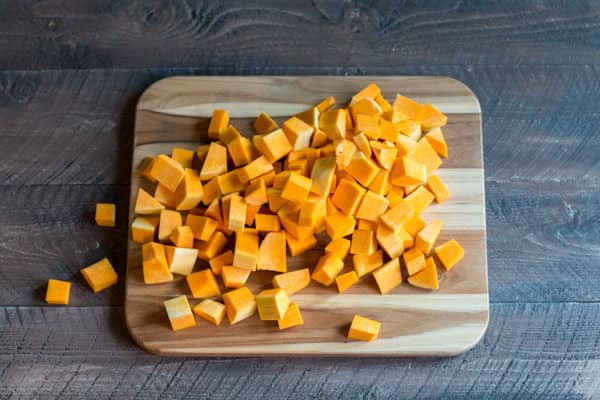 cubed butternut squash on a cutting board.