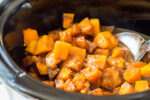 cooked spiced butternut squash in the slow cooker.