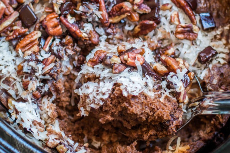 close up photo serving german chocolate spoon cake