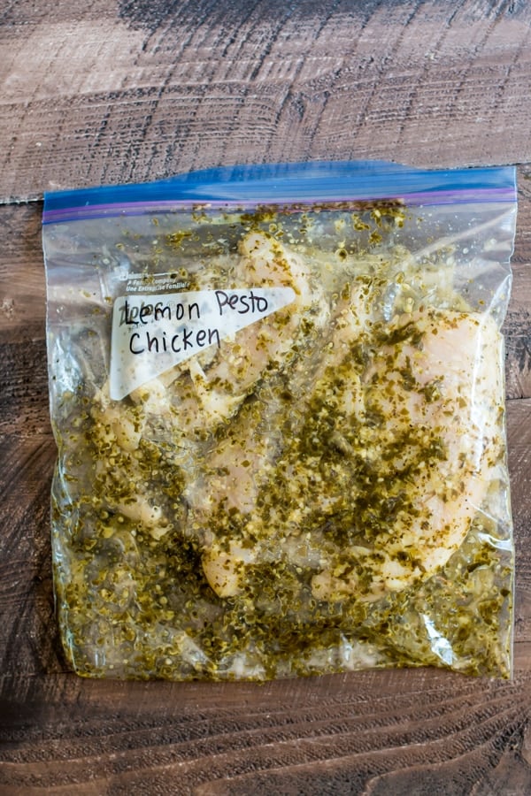 ziplock bag filled with chicken and pesto