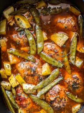chicken thighs, snow peas and squash in sauce,.