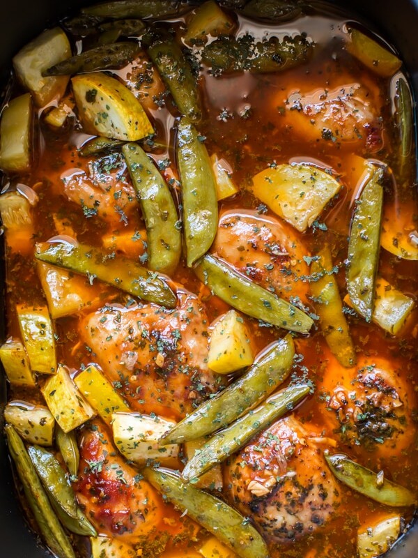 chicken thighs, snow peas and squash in sauce,.