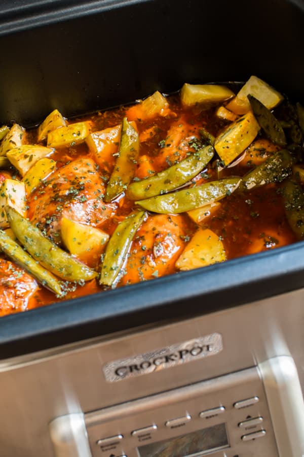 sweet and spicy chicken in a slow cooker.