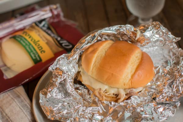 slow cooker cheesy cajun pork sandwiches