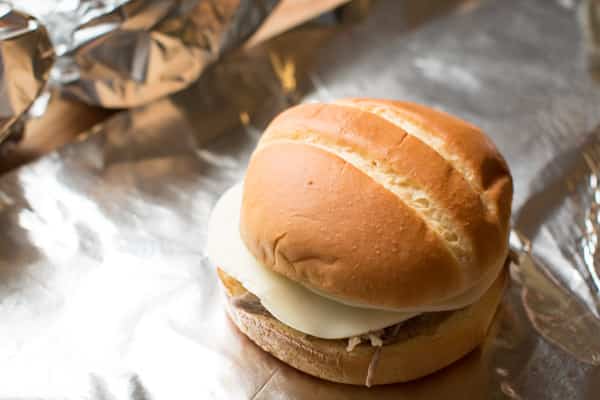 pork sandwich on foil