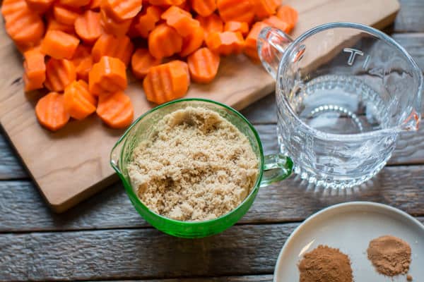 carrots, brown sugar, water and seasonings on a plate.