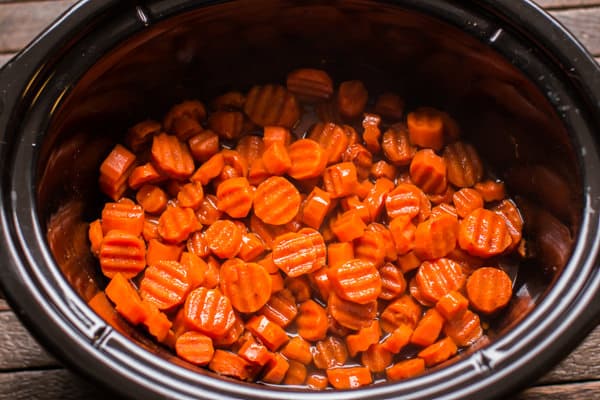 finished cooking candied carrots in a slow cooker.