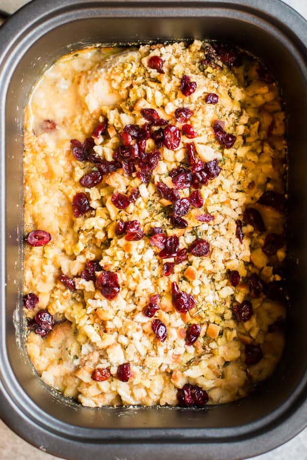 chicken breasts, stuffing and cranberries in a slow cooker.