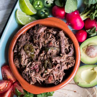 close up of bowl of mexican shredded beef.