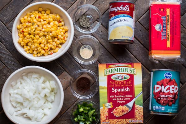 fiesta corn, cream of chicken, box of spanish rice, cheese, diced tomatoes and onion.