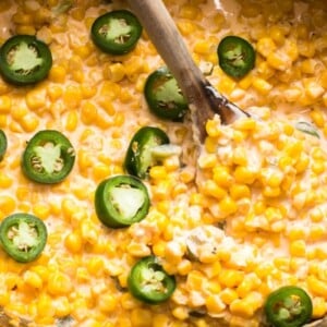 creamy jalapeno corn with a spoon in it.
