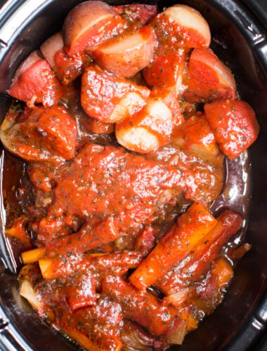 close up of Italain pot roast with tomato sauce on top.