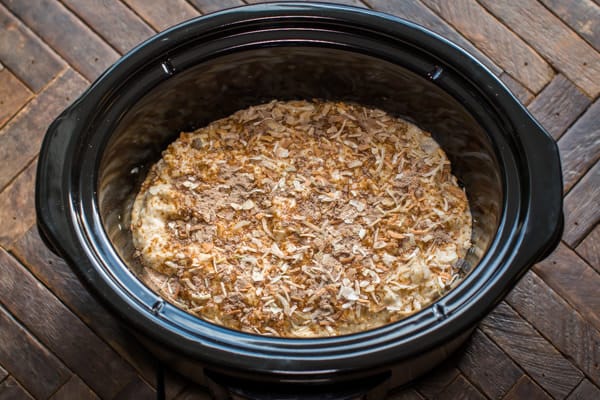 uncooked no peek chicken in a slow cooker.