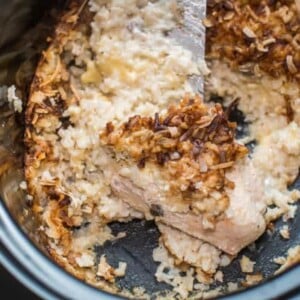 no peek chicken in a slow cooker with a spatula in it.