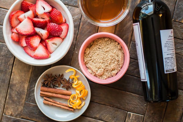 Wine, cut strawberries, brown sugar, spices and apple juice