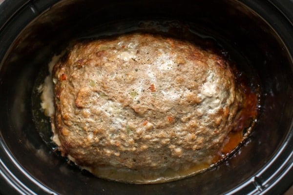 cooked stovetop stuffing turkey meatloaf in a slow cooker.