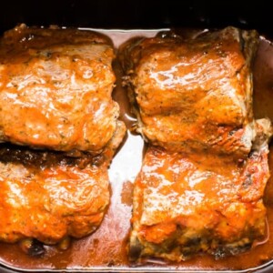 4 baby rack rib pieces in buffalo sauce.