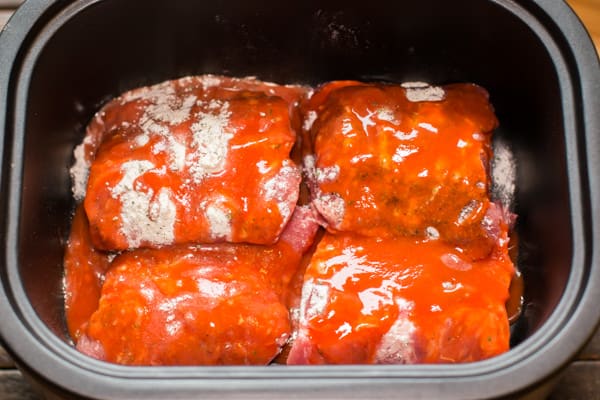 raw ribs with buffalo sauce and ranch