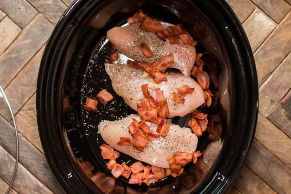 3 chicken breasts and cooked bacon in a slow cooker