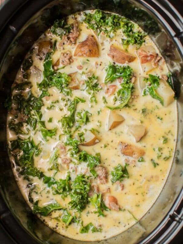 zuppa toscana soup done cooking in a slow cooker.