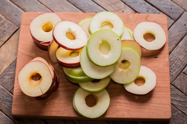 sliced apples on a cutting board