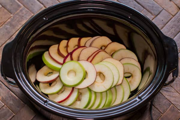 sliced apples in a slow cooker