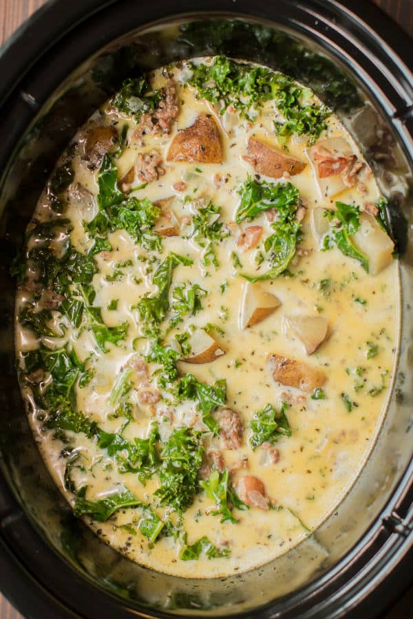 sausage, potato and kale soup in a slow cooker.