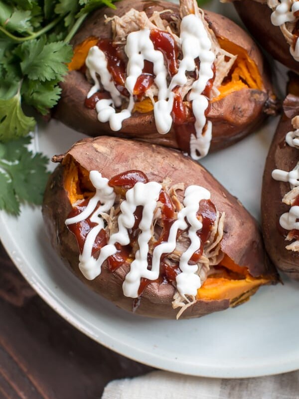 pulled pork inside of sweet potatoes.
