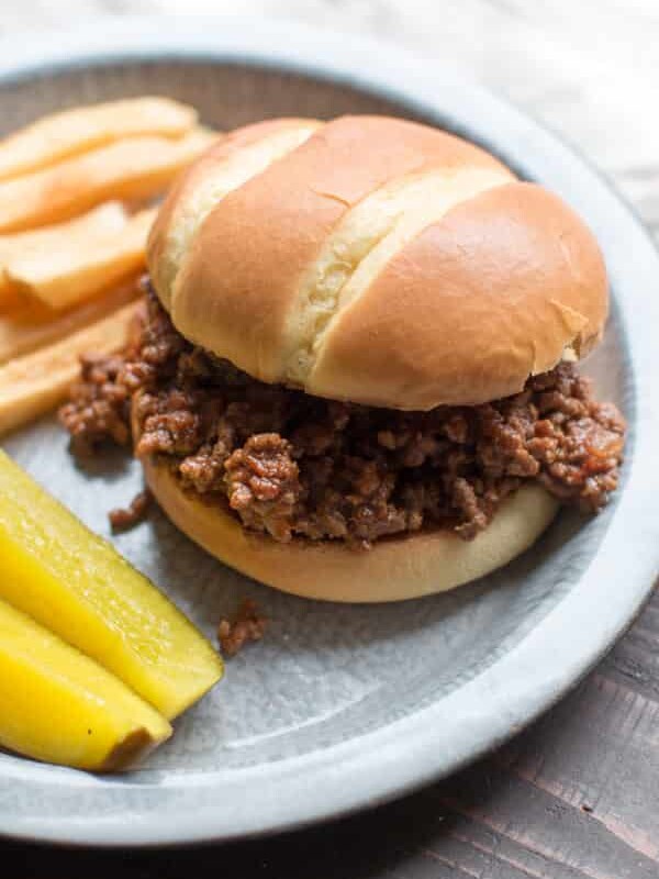 close up of barbecue beef sandwich on a pie tine.